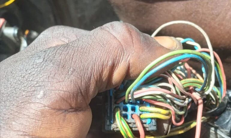 John Haruna Peugeot, Apo Mechanic Village, Abuja